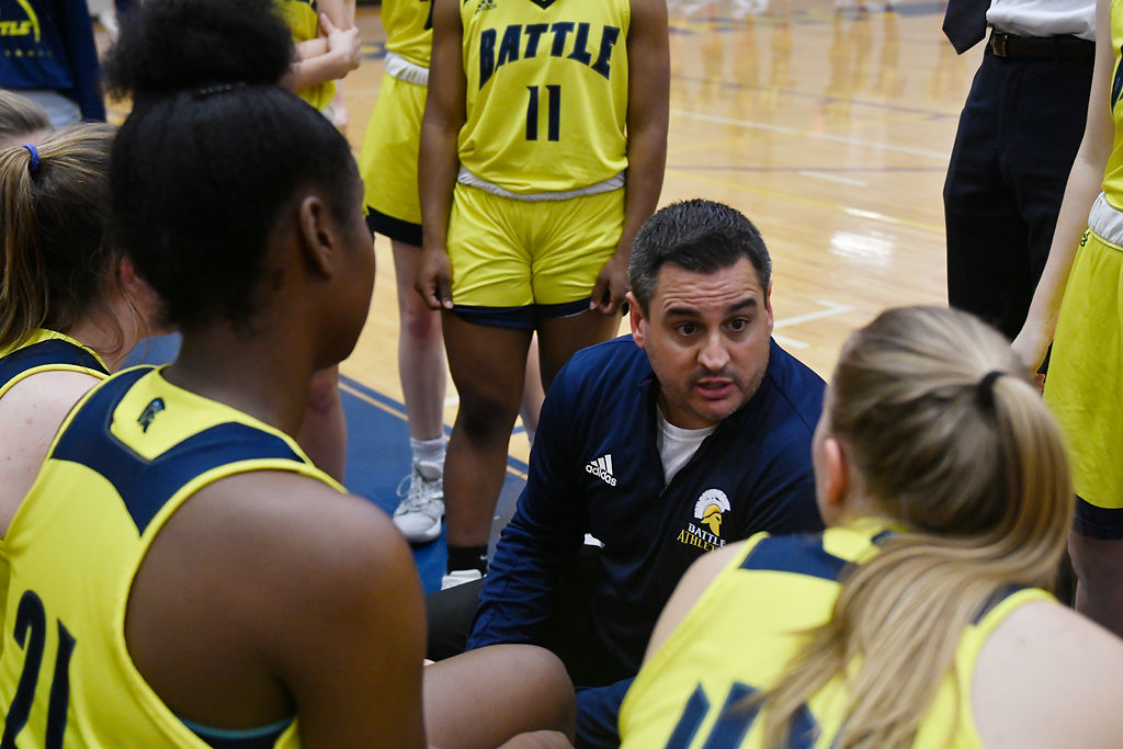 Michael Fernandez talks to his team during a time out in the fourth quarter